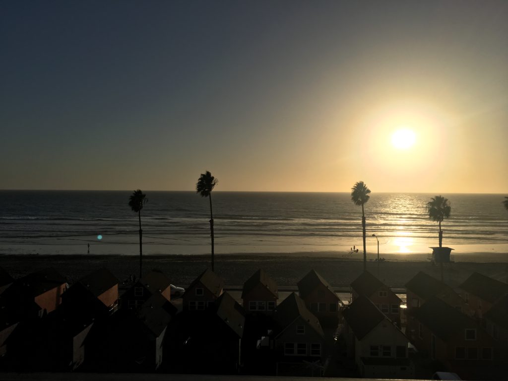 Our view at sunset from our beach rental in Oceanside